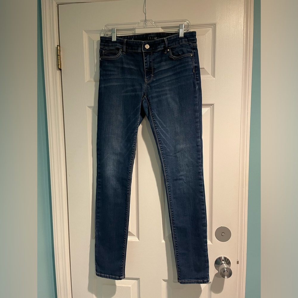 White House Black Market The Slim. Size 6. Medium wash.